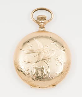 United States Watch Co. Pocket Watch In Gold-Filled Case: United States Watch Co. pocket watch in decorative Keystone gold-filled full hunter case. Runs. Watch face 1" wide. Serial number 745132.