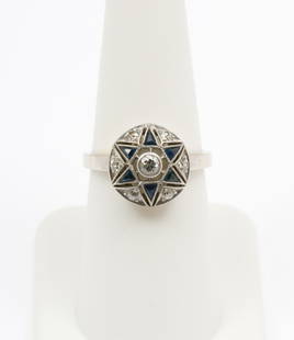 14k White Gold American Legion Auxiliary Ring: Size 6.5. Tests 14k. Seven diamonds and six sapphires in star form. In original Cooper Bros, Philadelphia, PA ring box. 3.7 grams.