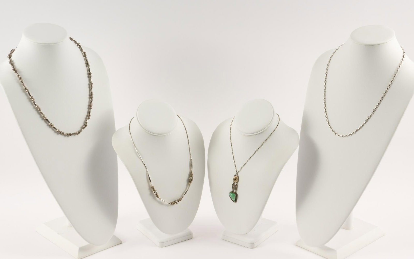 4 Sterling Necklaces: Including turquoise. 1.59 ozt total. 1/4" to 1/2" wide x 21" tp 24" long. No condition issues. MEG