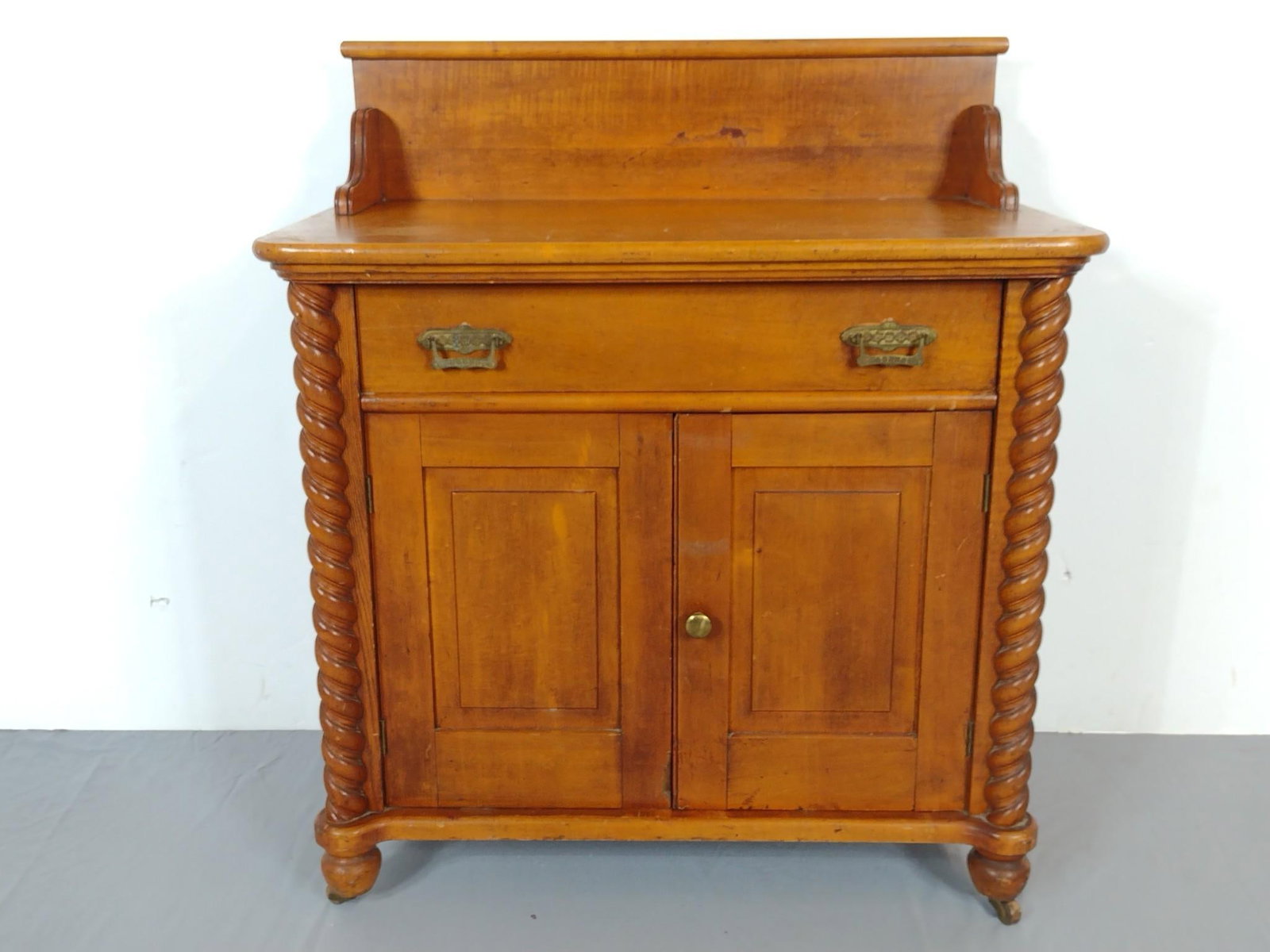 Barley Twist Wash Stand: 32" wide X 18" deep X 36-1/4". Top has some light scratches and some areas of finish loss. MG.