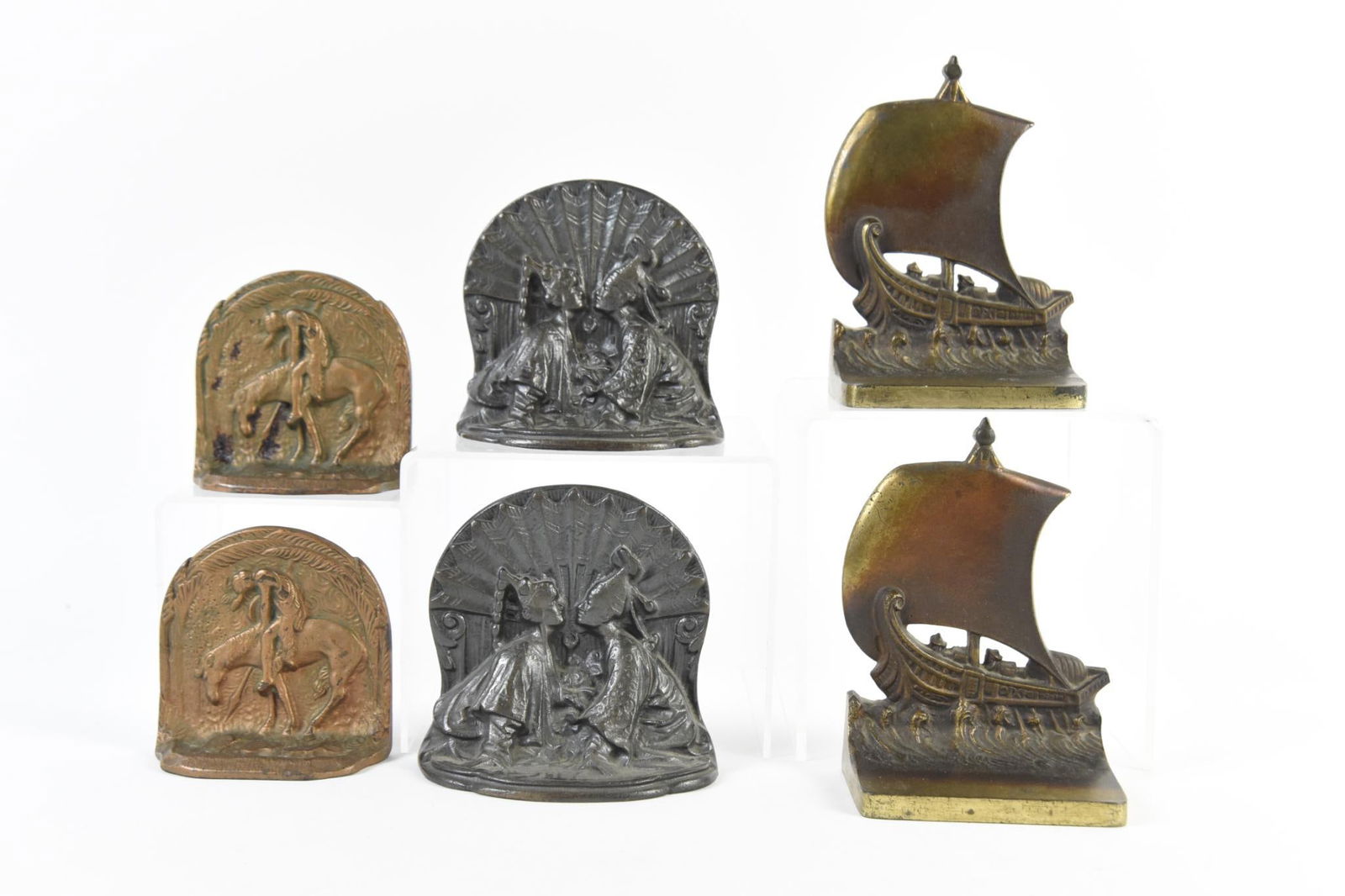 3 Pairs of Antique Bookends: All unmarked. Includes Chinese kissing couple. 3-3/4" to 5" wide x 4" to 5-3/4" high. JS