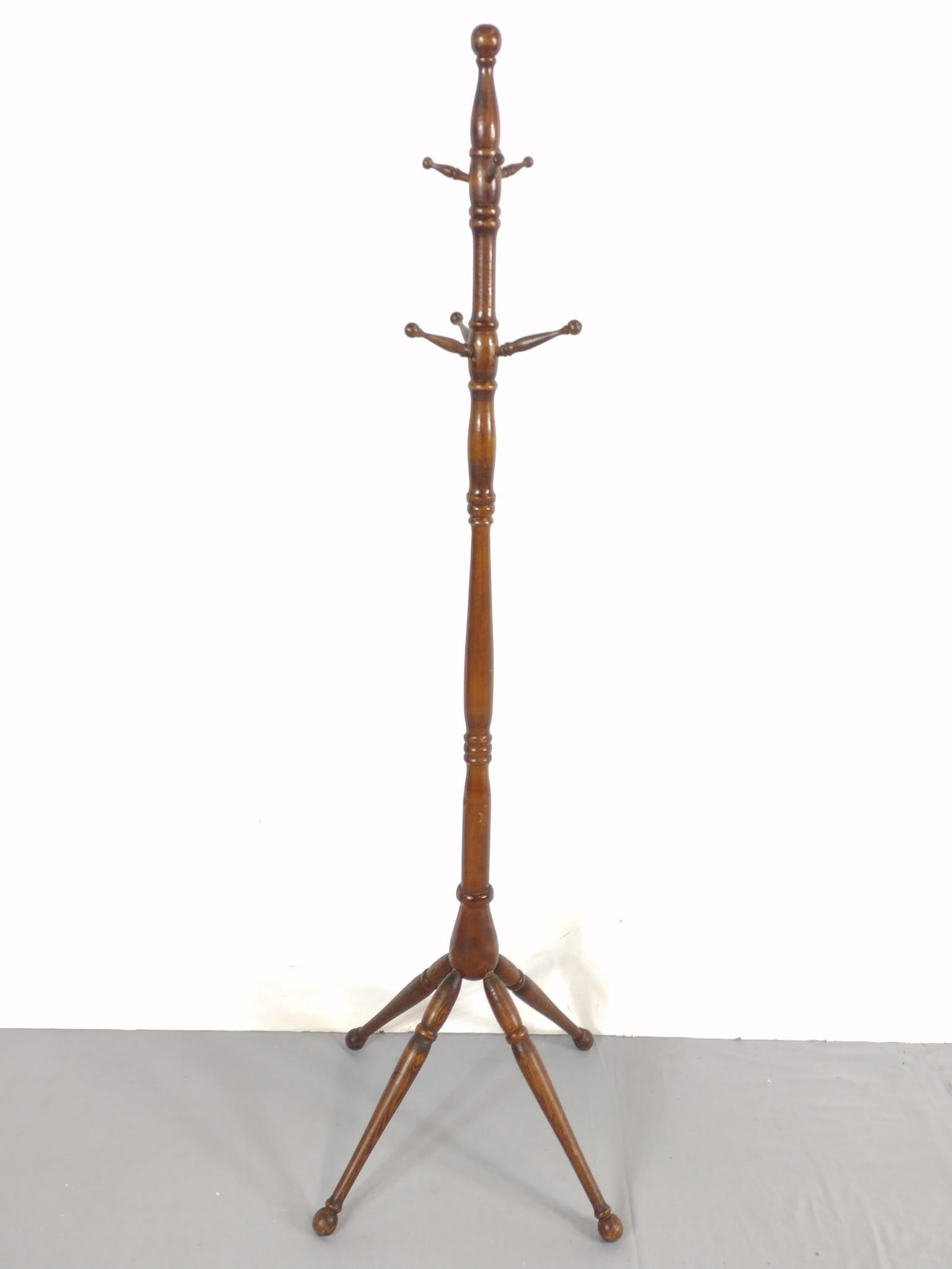 Coat Tree: 18" wide X 18" deep X 66" high. Has some scratches. MG.