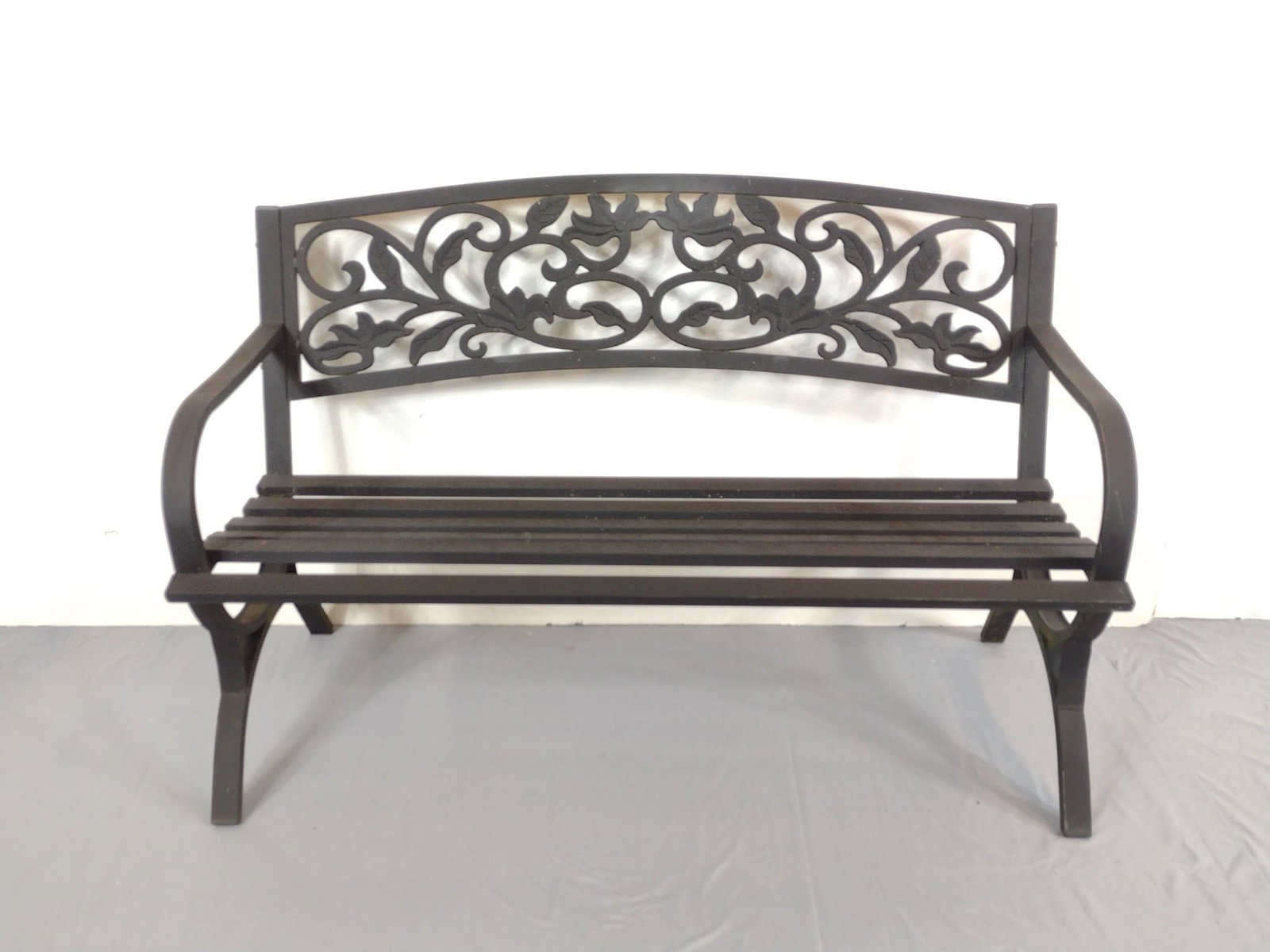 Metal Bench: 50" wide X 22" deep X 33" high. Has small areas of rust. MG.