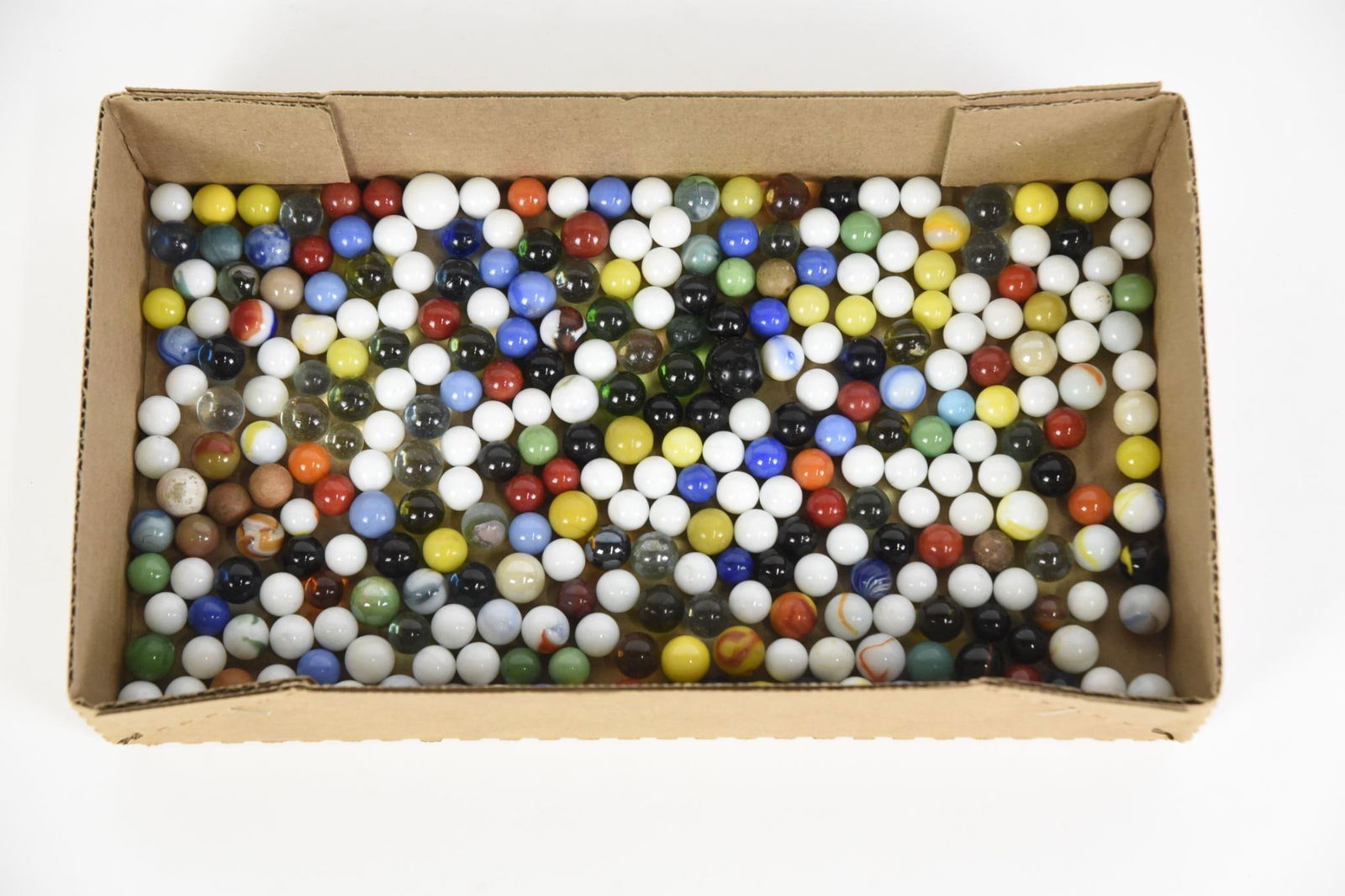 Grouping of Vintage Marbles: Includes glass and stone. Various sizes and condition. LR