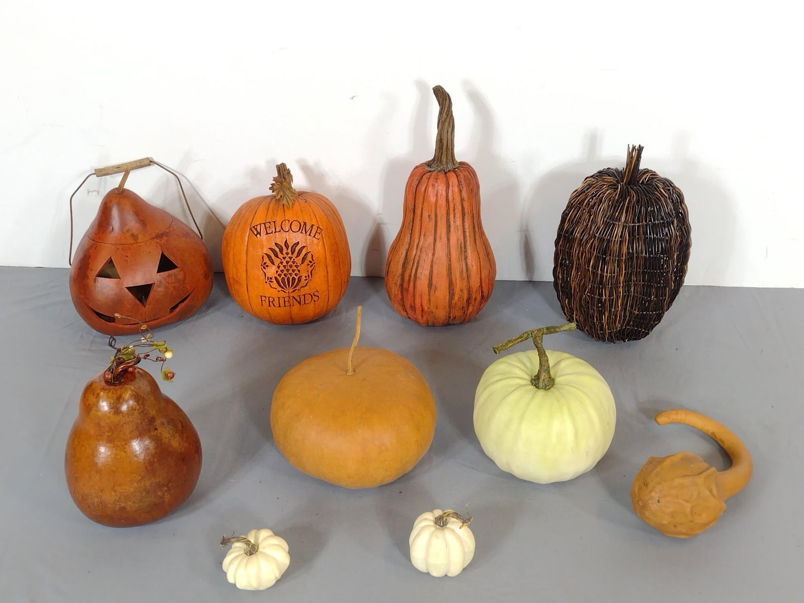 10 Assorted Gourds & Pumpkins: 5" to 19" high. Includes dried gourds, wicker, ceramic, plastic.