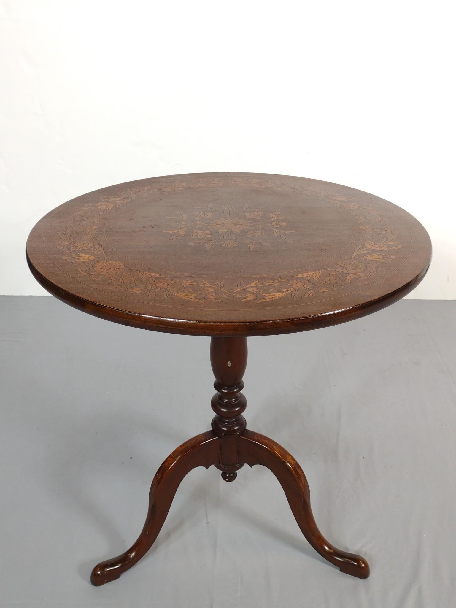 Inlaid Tilt Top Table: 25" diameter X 26-1/2" high. Has a few light scratches to base. MG.