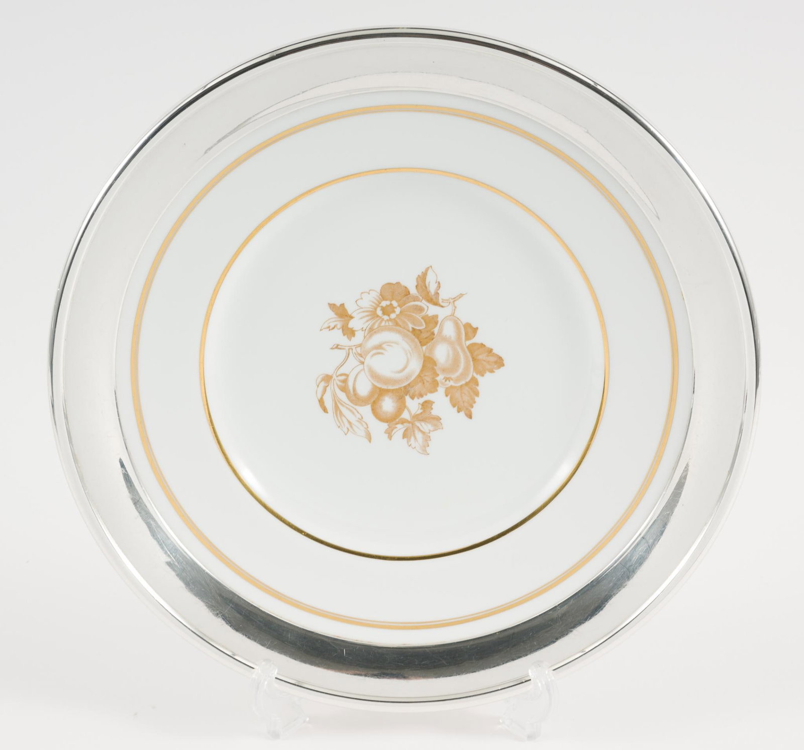 Spode Plate w/ Pishel Sterling Silver Rim: Plate marked Spode. Sterling marked Pishel sterling. 13-1/2" diameter x 1-1/4" high. Light scratching to sterling consistent with use. MEG