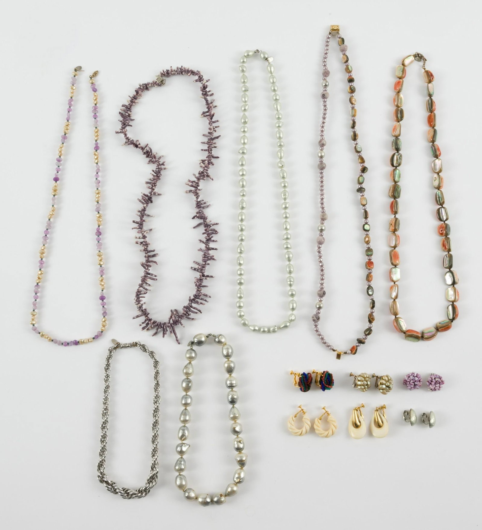 13 Pcs. Les Bernard Jewelry: Includes (6) pairs Les Bernard screw back earrings and (7) Les Bernard necklaces. Necklaces: 1/2" to 1" wide x 17" to 29" long. Earrings: 3/4" to 7/8" wide x 7/8" to 1-3/4" long. No condition issues. 