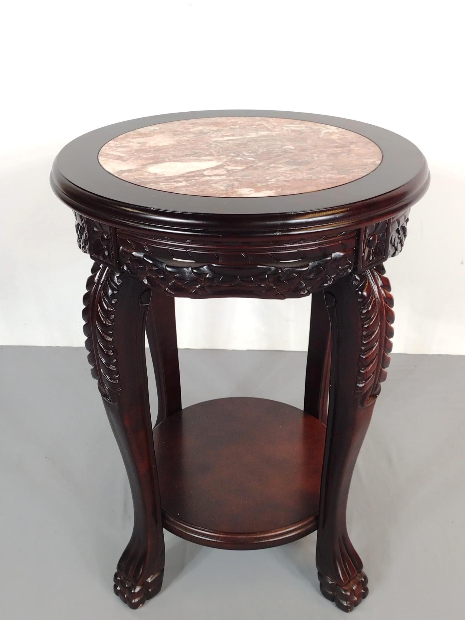 Rosewood Marble Top Occasional Table: 23" diameter X 30-1/4" high. Has a few light scratches. No manufactures name found. MG.
