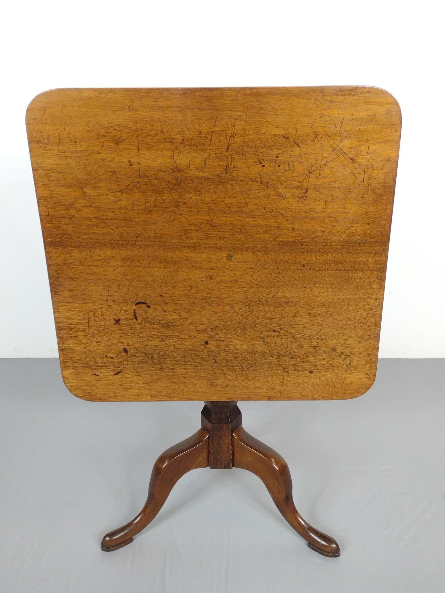 Tilt Top Table: 29" wide X 28" deep X 29" high. Has a few light scratches. MG.