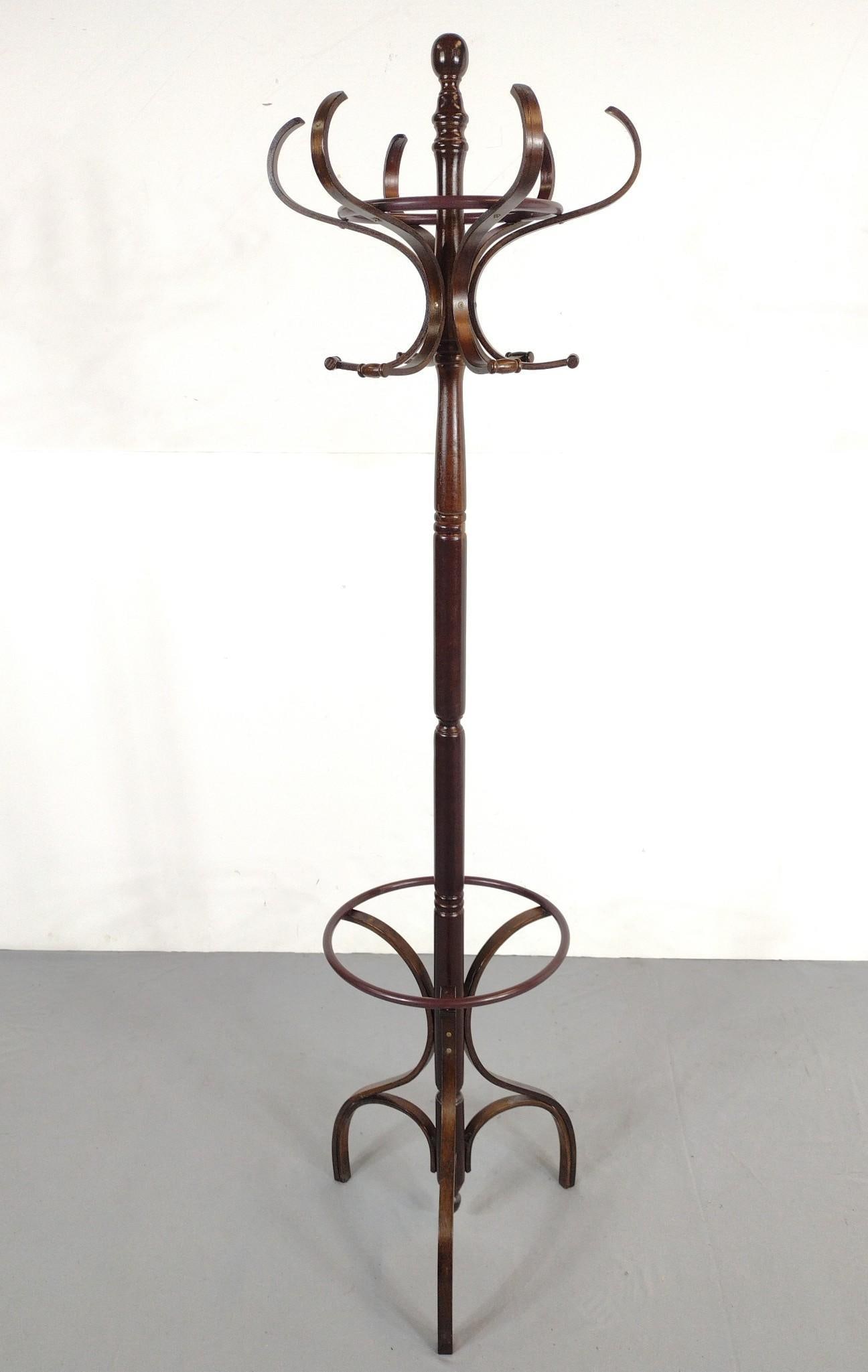 Coat Tree With Revolving Top: 18-3/4" diameter X 73" high. Has a few light scratches. MG.