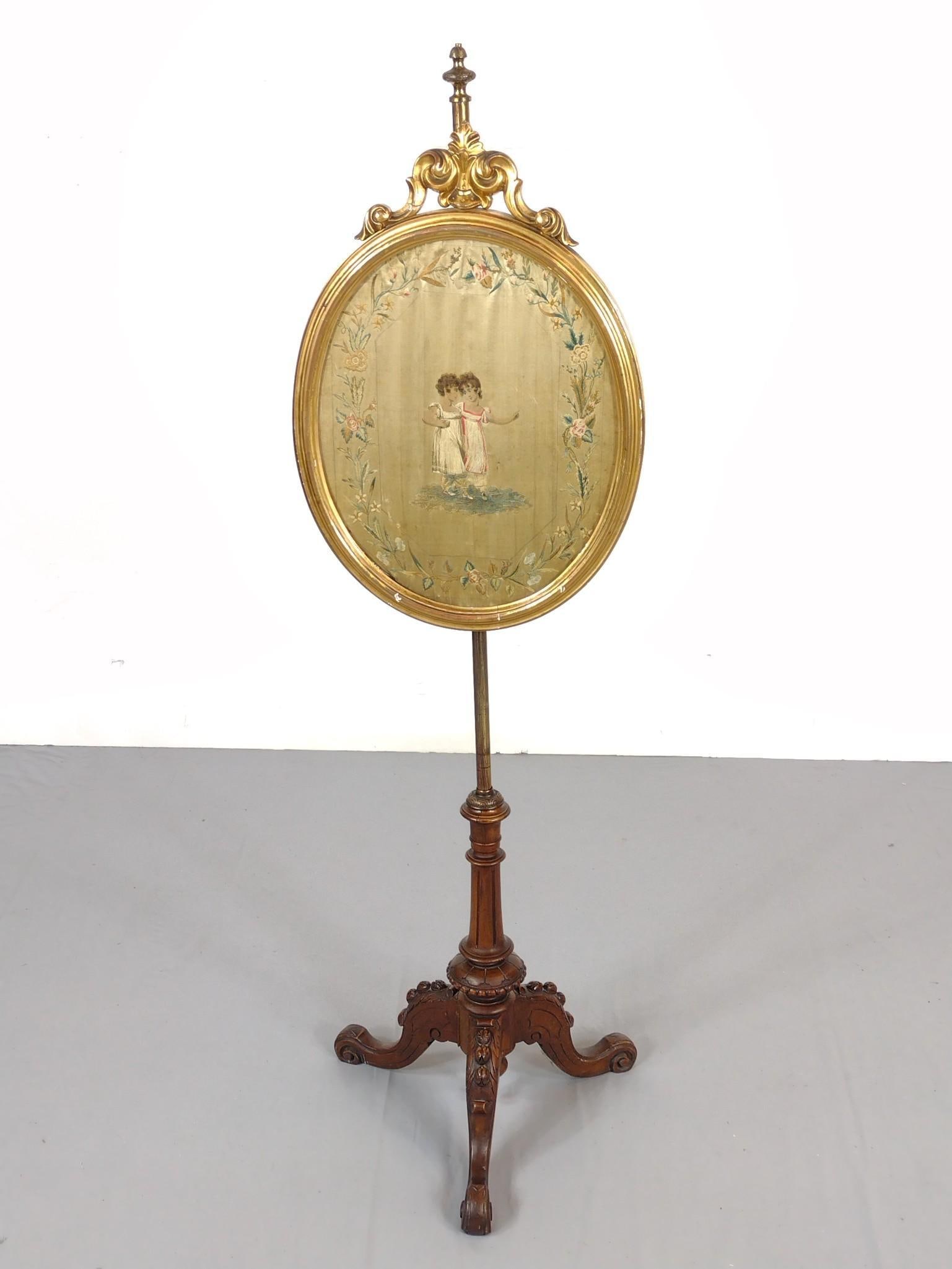 Figural Fire Screen: 17" wide X 17" deep X 54-1/4" high. Frame has some losses. MG.
