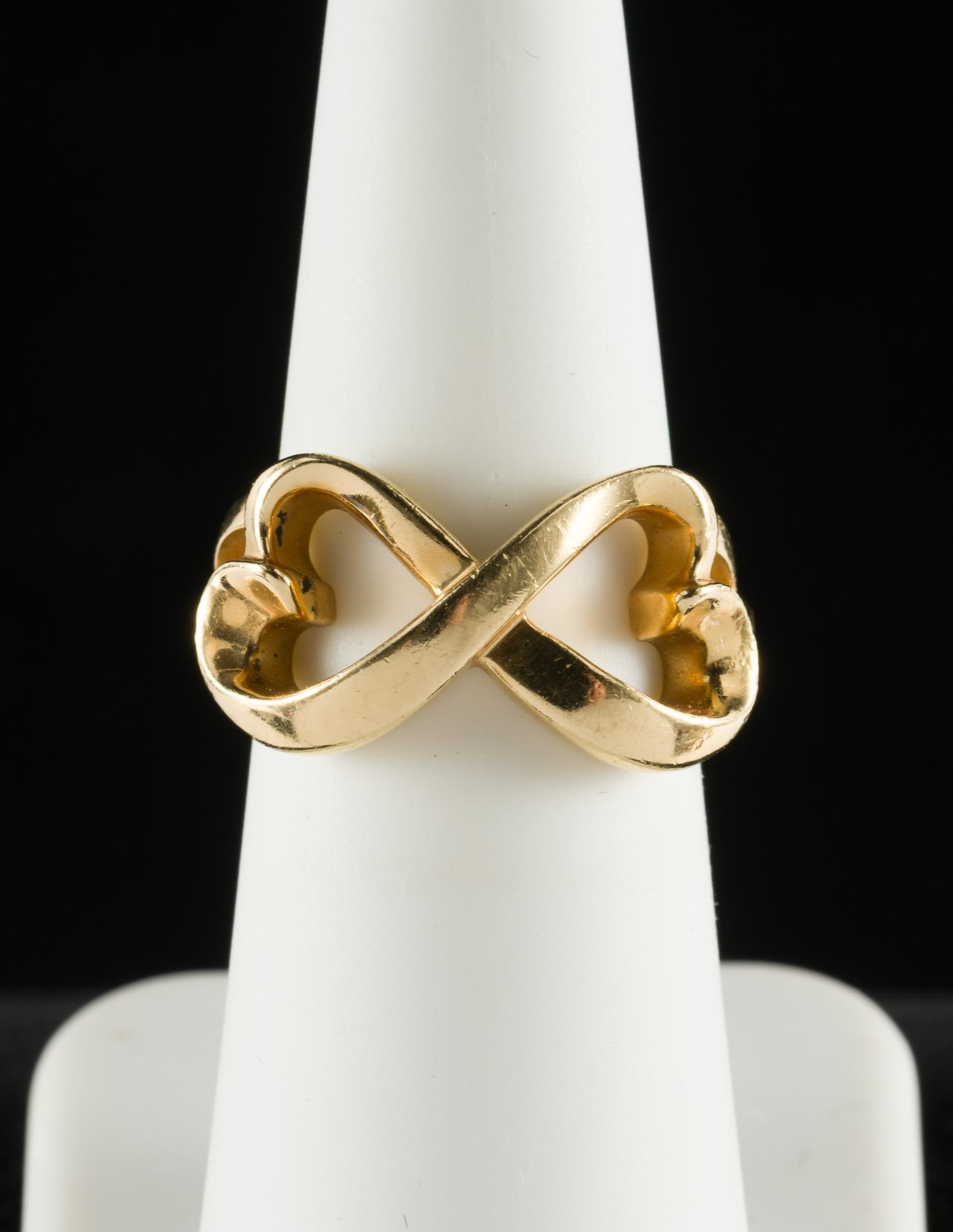 Tiffany & Co. 18k Gold Paloma Picasso Ring: DESCRIPTION: 18k (marked 750) Tiffany & Co. Paloma Picasso yellow gold stylized bow ring. MEASUREMENTS: Weight 10 grams. Size 6.