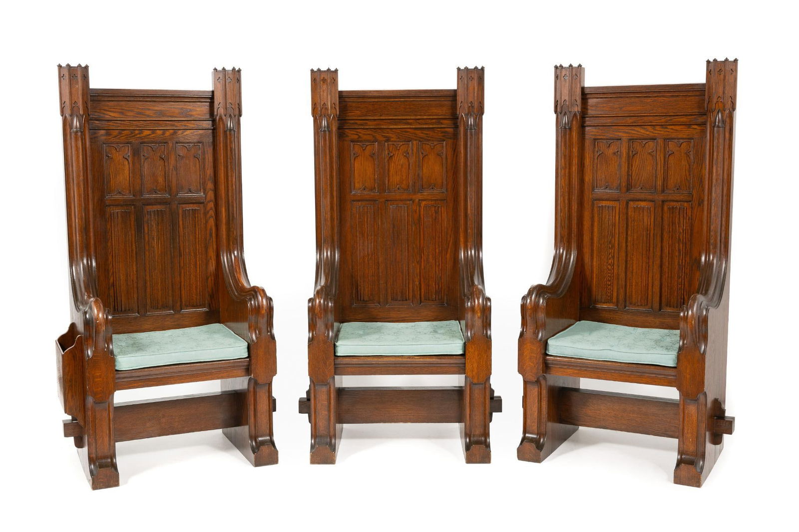 Three Arts & Crafts Style Chairs: DESCRIPTION: Three arts and crafts style ecclesiastical or great chairs made of oak, probably Midwestern in origin, circa 1900. The form consisting of upright oak supports joined with mortise tennon a
