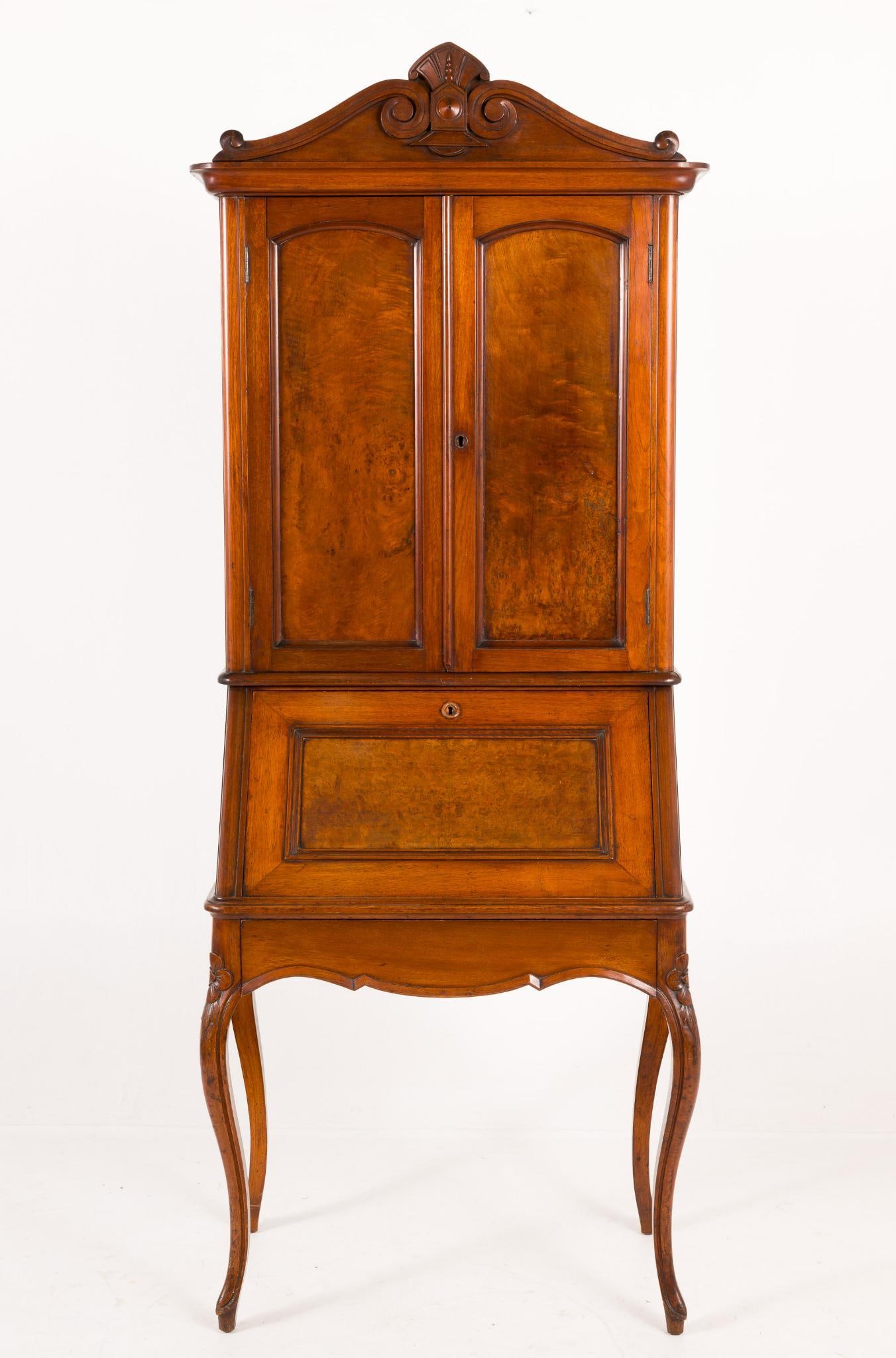 Louis XV Style Lady's Writing Desk: DESCRIPTION: Very fine Louis XV style lady's writing desk probably 19th century. The form consisting of dramatic cabriole legs rising to a tapered case with fall board that drops to reveal lighter woo