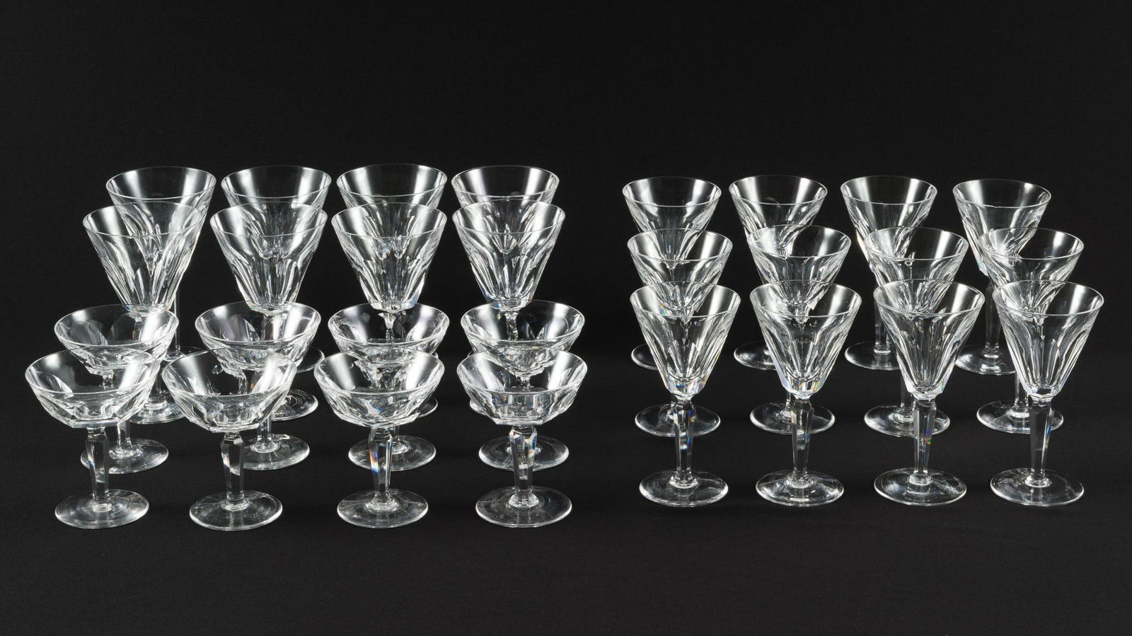 28 Pcs Waterford Shelia Stemware: DESCRIPTION: Waterford Shelia stemware. Includes 8 water goblets, 12 claret wine glasses, and 8 champagne/tall sherbet glasses. All marked on bottom. MEASUREMENTS: 3-1/2" to 4" diameter x 4-3/4" to 7"