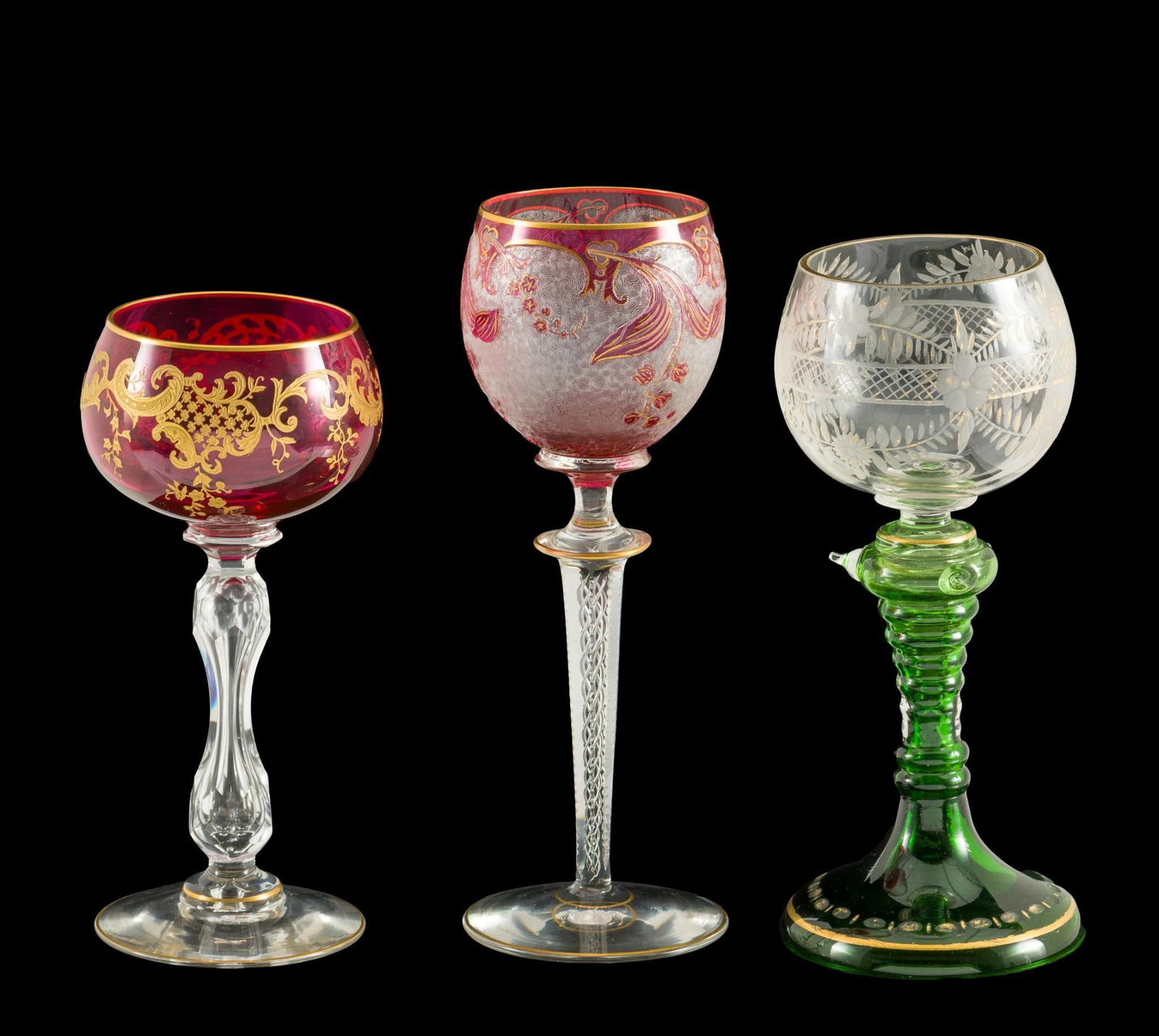 3 Moser Stems: DESCRIPTION: Includes (1) Green trumpet stem wine glass 3-1/4" diameter x 7-1/2" high; (2) cranberry gold decorated port wine glass 2-3/4" diameter x 6-3/4" high; and (3) cameo cut wine glass with air