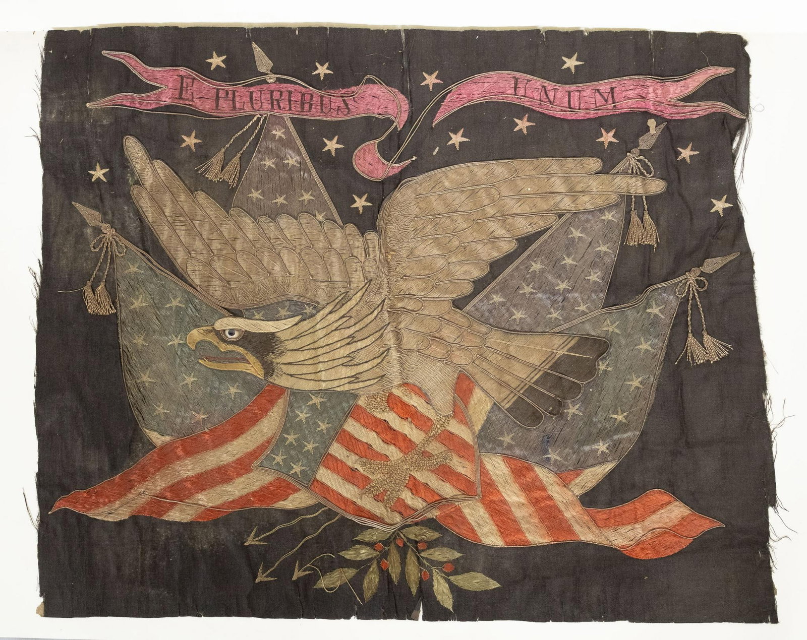Spanish-American War Naval Banner: Banner from the Spanish-American War era of a raised eagle with "E Pluribus Unum" across the top. Fraying to edges and corners and loss to some backing. 19-1/4" high x 23" wide. Some looseness to stri