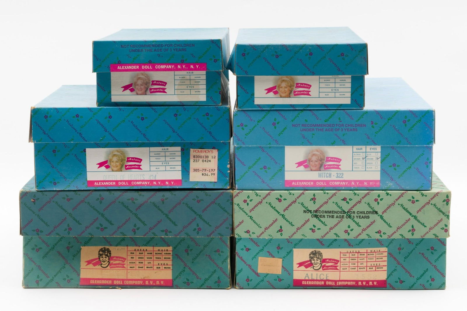 6 Madame Alexander Dolls: Six Madame Alexander dolls in original boxes. Includes Queen of Hearts, Alice, Goldilocks, Witch, and (2) Jack. Dolls measure 7-1/2" to 12-1/4" long. Boxes measure 5-1/2" to 9-1/4" wide x 8-1/4" to 14