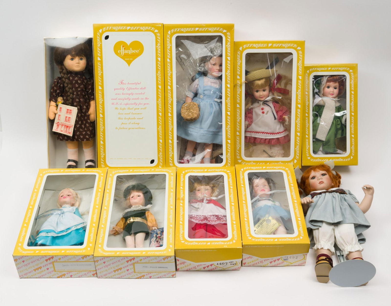 10 Dolls: Includes (8) Effanbee Dolls all in original boxes; (1) Dolly Lollipop in original box; and (1) Seymour Mann porcelain dolls. 6-3/4" to 8-1/4" wide x 3-3/4" to 4-1/2" deep x 12-1/4" to 18" long. Some l