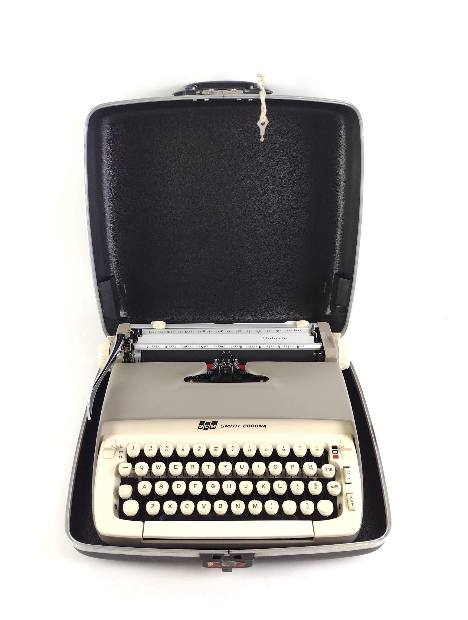 Smith Corona "Galaxie" Typewriter: 14" wide x 12-1/2" deep x 6" high. LR