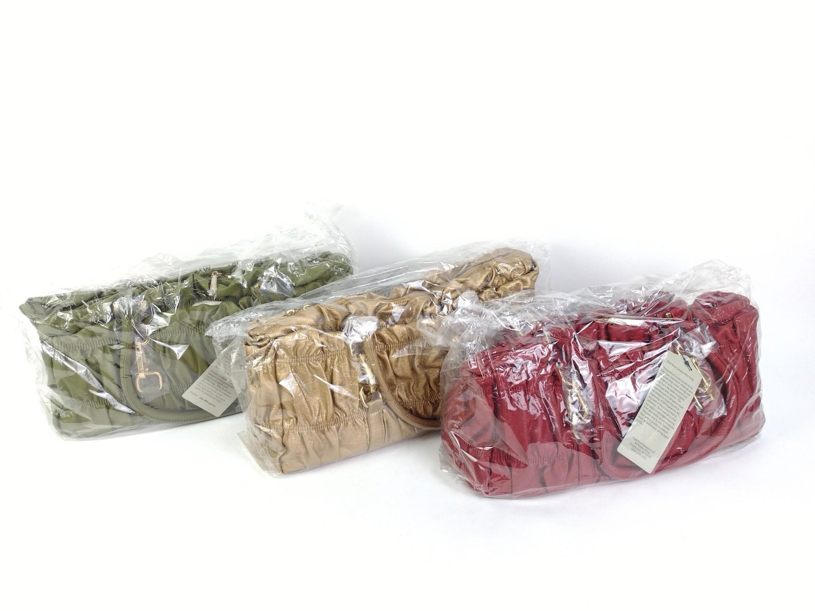 3 JM Handbags: Green, red, and gold. In original packaging. With 2 dust covers. 8" high x 16" wide x 6" deep. EK