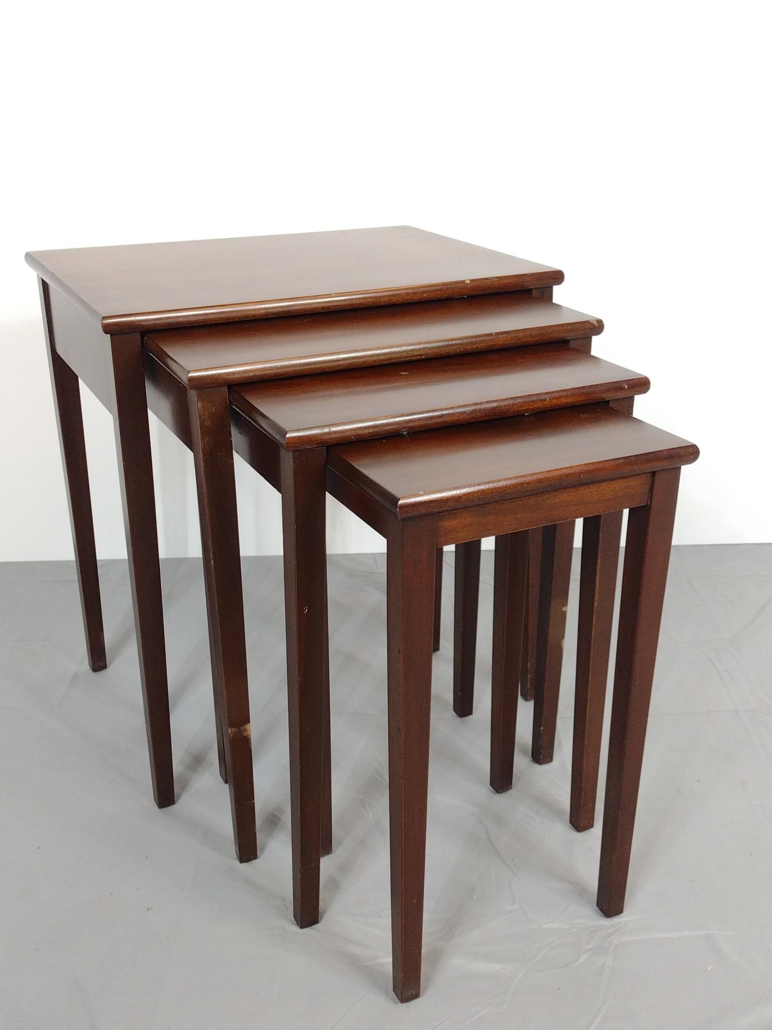 4 Nesting Tables: No makers mark found. 12" to 22" wide x 21-1/4" to 24-1/4" high. All with scratches to wood finish.
