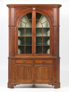 18th C Pennsylvania Walnut Chippendale Corner Cupboard: 18th century Pennsylvania walnut Chippendale corner cupboard. Probably Cumberland Valley. Circa 1770-1790. Two part free standing cupboard rests on re-enforced bracket feet. The bottom section with tw