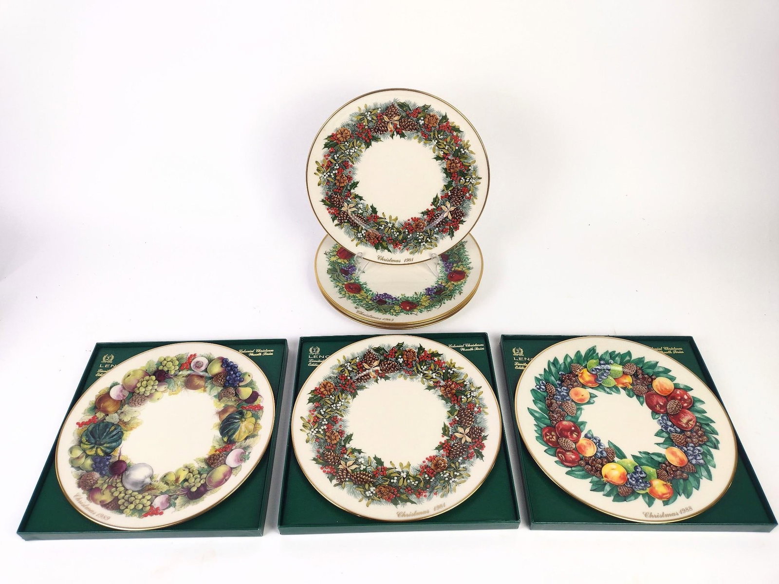 7 Lenox Christmas Plates: Each 10-3/4" diameter. 3 with original box.