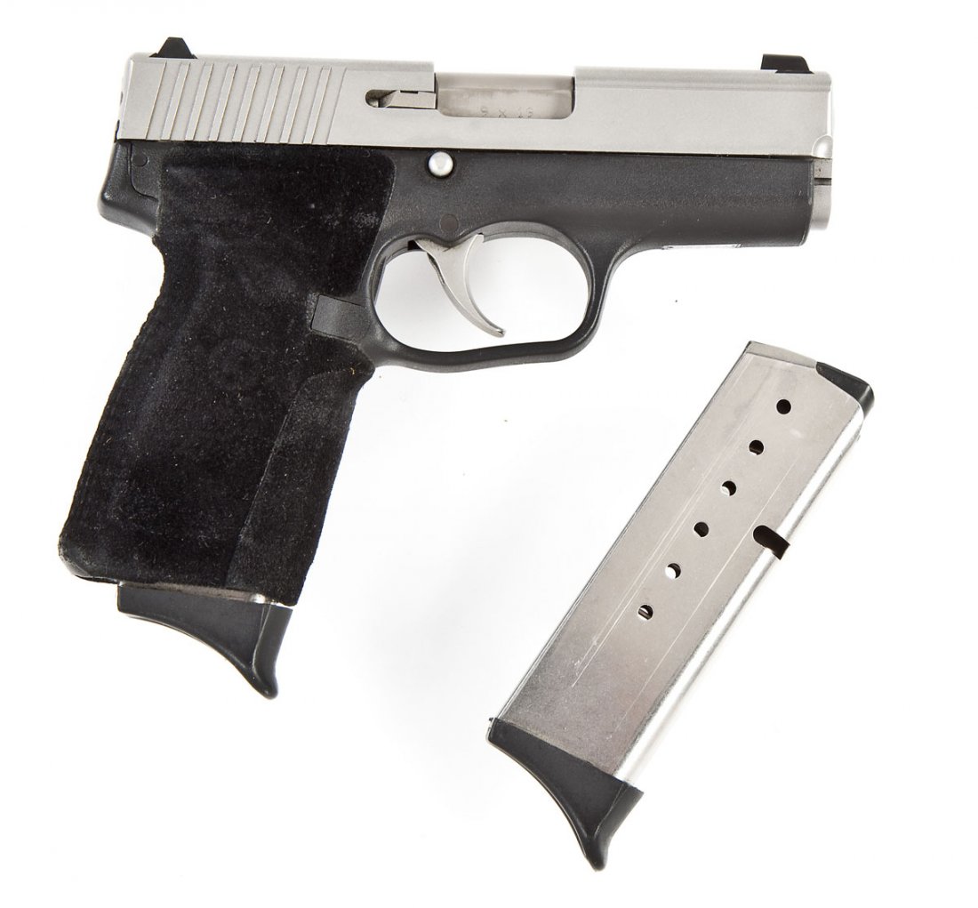 Kahr Arms P-9 Pistol - 9mm Cal: SERIAL #: YA8796 DESIGN: Semiautomatic with detachable magazine. 3-1/2" barrel. MATERIAL/FINISH COMPOSITION: Stainless steel. Black polymer grip frame. FEATURES: Bead front night sight. Rear sight is 