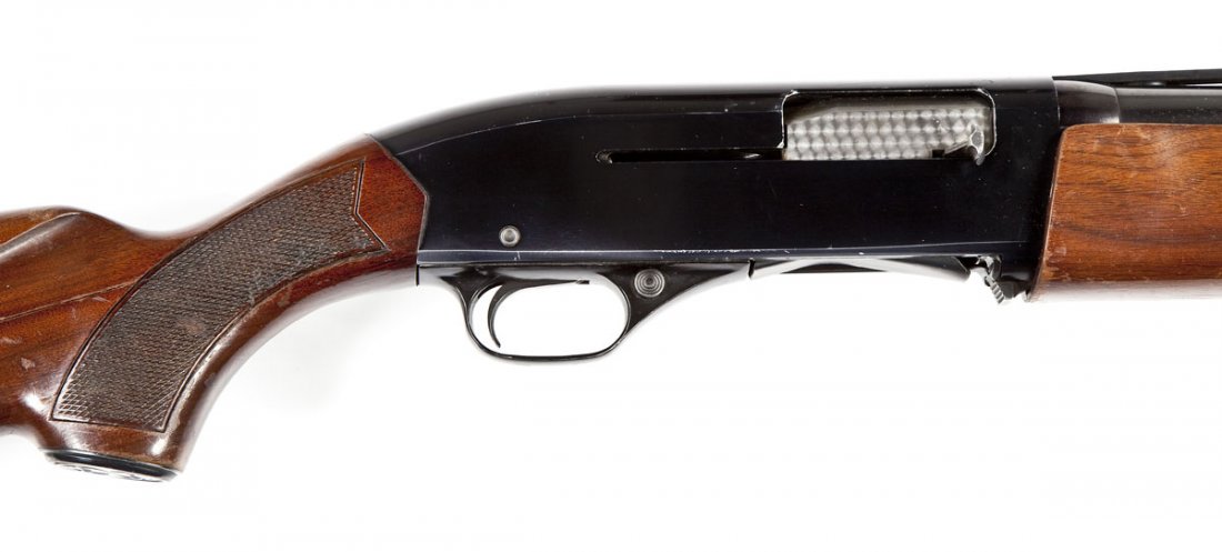 Winchester Model 1400 Shotgun - 12 Ga.: SERIAL #: N609228 DESIGN: Semiautomatic with tubular magazine. 28" vent rib barrel. Chambered for 2-3/4" shells. MATERIAL/FINISH COMPOSITION: Blued steel except for the bolt. Checkered wood pistol gri