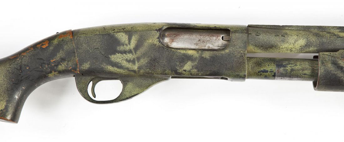 Smith & Wesson Model 916T Shotgun - 12 Ga.: SERIAL #: None DESIGN: Pump action with tubular magazine. 28" vent rib modified choke barrel. Chambered for 2-3/4" & 3" shells. MATERIAL/FINISH COMPOSITION: Blued steel except for the bolt. Wood pisto