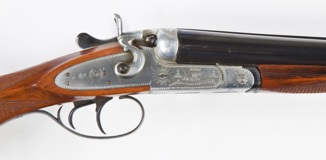 Waffen Frankonia Model "Forest" Shotgun - 16 Ga.: SERIAL #: 21190 DESIGN: Side by side side lock. 27-5/8" choked barrels. Chambered for 2-1/2" shells. MATERIAL/FINISH COMPOSITION: Blued steel barrels, lever, triggers and trigger guard. Plated receive