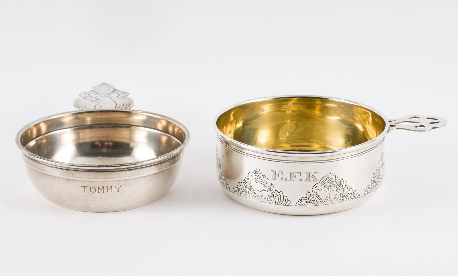 2 Sterling Child's Porringers: Includes Reed & Barton and R. Blackinton & Co. One with clown handle, one with ducks and bunnies scene. Total 6.89 ozt. 6" to 7" diameter x 1-1/2" to 1-3/4" high. MEG