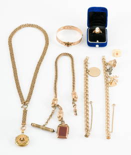 7 Pieces Antique and Gold-filled Jewelry: Includes cameo ring size 8, locket with photos on chain, watch fob and chain, two charm bracelets (one 14KT heart charm, others unmarked), bangle bracelet with garnets, and carved rose pendant. Bangle