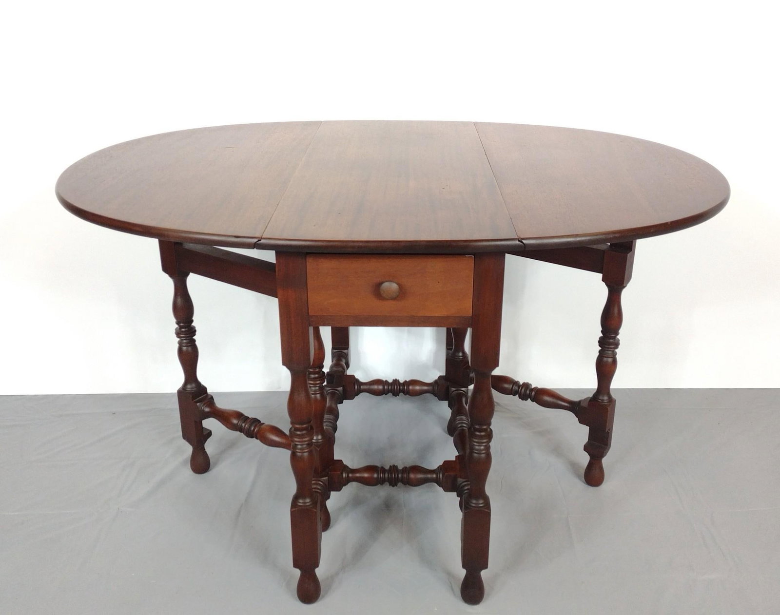 Single Drawer Gate Leg Table: Open 48", Closed 15-1/2" wide X 36" deep X 28-3/4" high. MG.