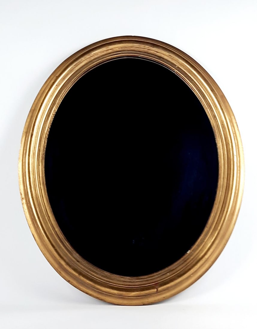 Gilt Oval Wall Mirror: Overall with frame 32" high x 27" wide. Minor finish losses / crack to frame. LR