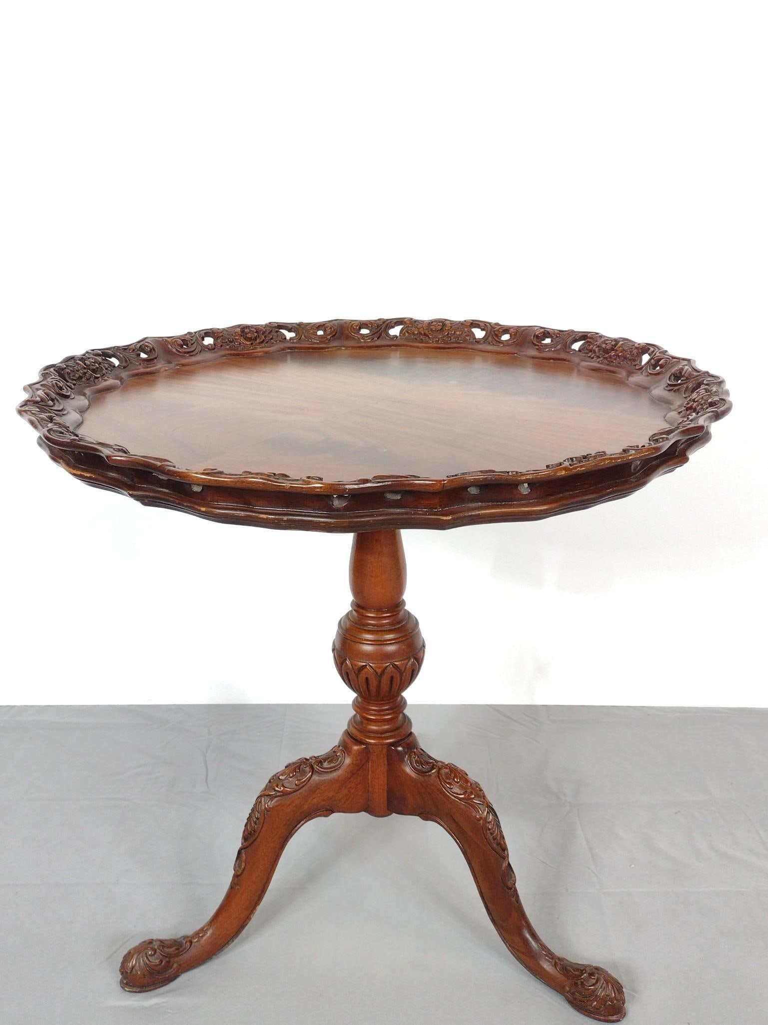 C.H. Lears Carved Pie Crust Table: 30" diameter X 28-1/2" high. Table top has some light scratches and small areas of finish loss. MG.
