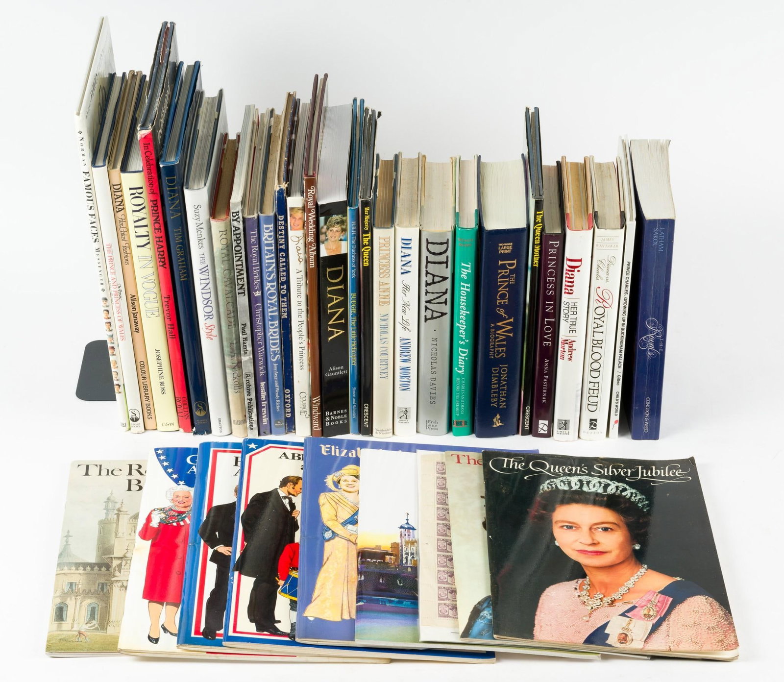 Grouping of Royal Family Books Including Princess Dianna: Includes English Royal Family books, Queen Elizabeth II, Prince Charles, Prince Harry, and more. All in good condition with normal wear and tear. CONDITION: Due to being in storage for a number of yea