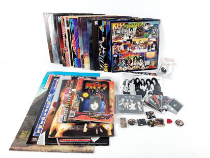 50 Pcs KISS Memorabilia incl Records and Trading Cards: Also includes photograph, pins, guitar pick, CD, Christmas ornament, prepaid phone card, magazines, and calenders. All with some wear consistent with age and use.