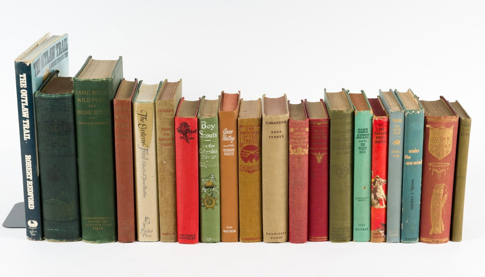 20 Western and Adventure Books: Includes Boy Scouts, Cimarron, Gene Autry, The Lone Ranger, and more. Mix of fiction and non-fiction. All in good condition with normal wear and tear. CONDITION: Due to being in storage for a number o