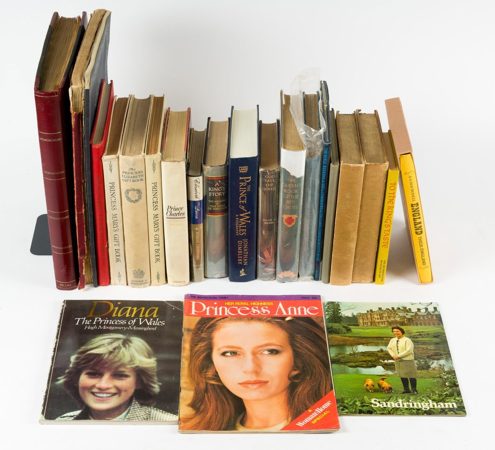 Grouping of Royal Family Books Incl Scrapbook: Includes Queen Elizabeth II, Coronation, Prince of Wales, Princess Mary, and more. All in good condition with normal wear and tear. CONDITION: Due to being in storage for a number of years, please not