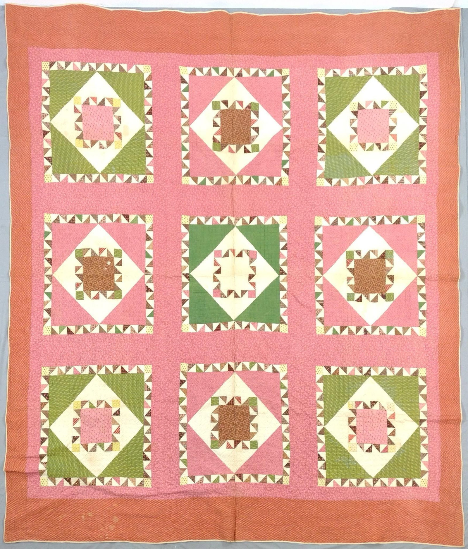 Vintage Patchwork Quilt: Some discoloration and losses.
