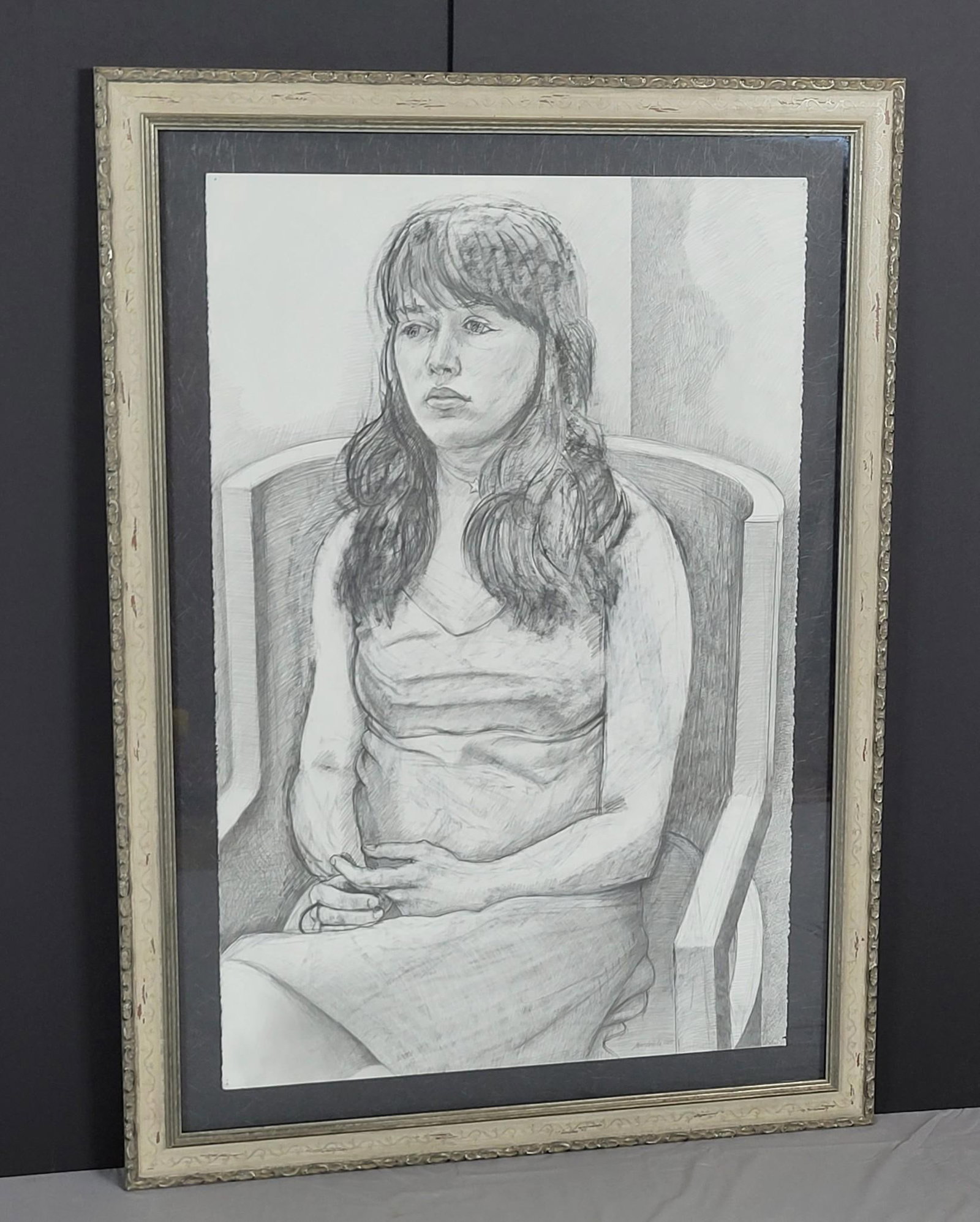 McBride Portrait Drawing: Alexander Sandy McBride, professor at Juniata College, PA. Graphite drawing of a girl. Sight 40" high X 26-1/4" wide. Overall with frame 48-1/2" high X 35-1/2" wide. Drawing with mounting holes at cor