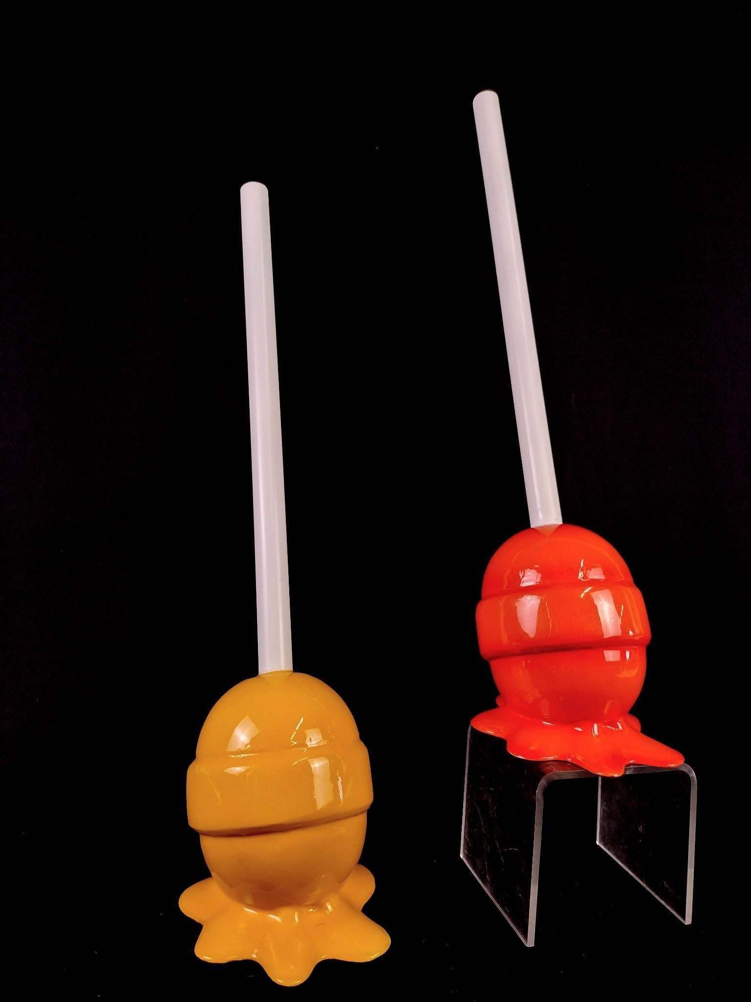 2 Elena Bulatova "The Sweet Life" Sculptures: Each 7" wide X 19" high. Bulatova’s artistic career catapulted in California putting her abstract paintings and her famous “Sweet Life” sculptures, Lollipops and Popsicles, into important pr