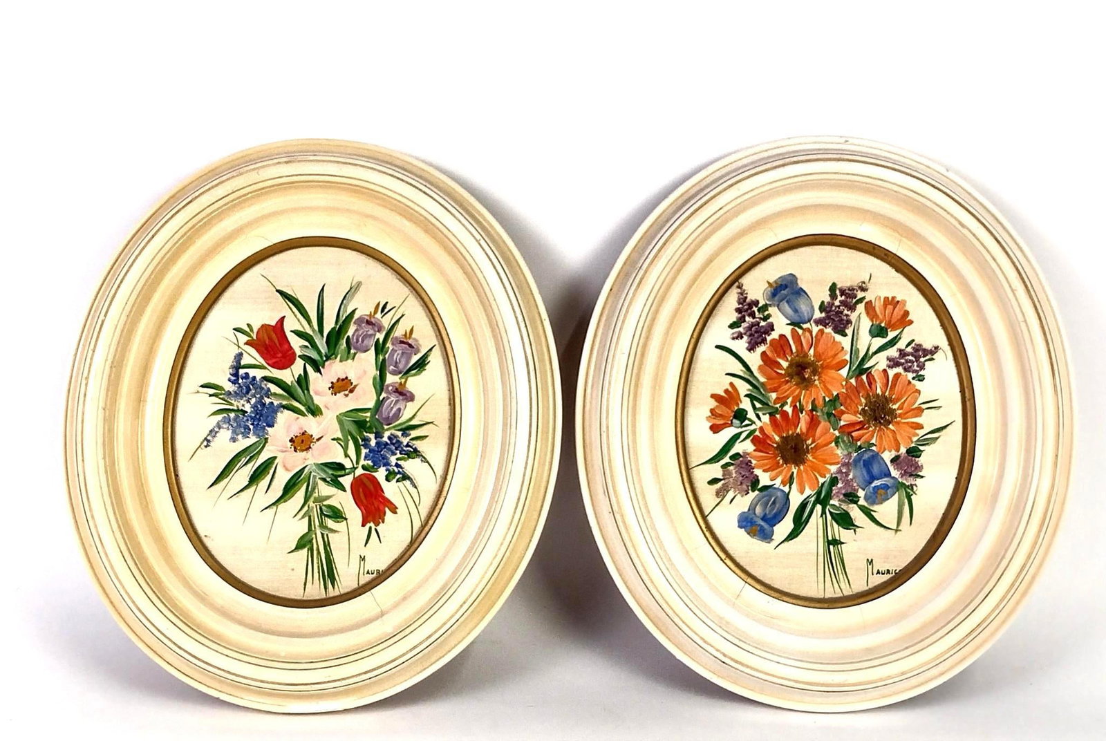 Pr Signed Floral Paintings: Both signed Maurice. Each sight: 9-1/4" high x 7-1/2" wide. Overall with frame each 15" high x 13" wide. Some discoloration and cracks to frames.