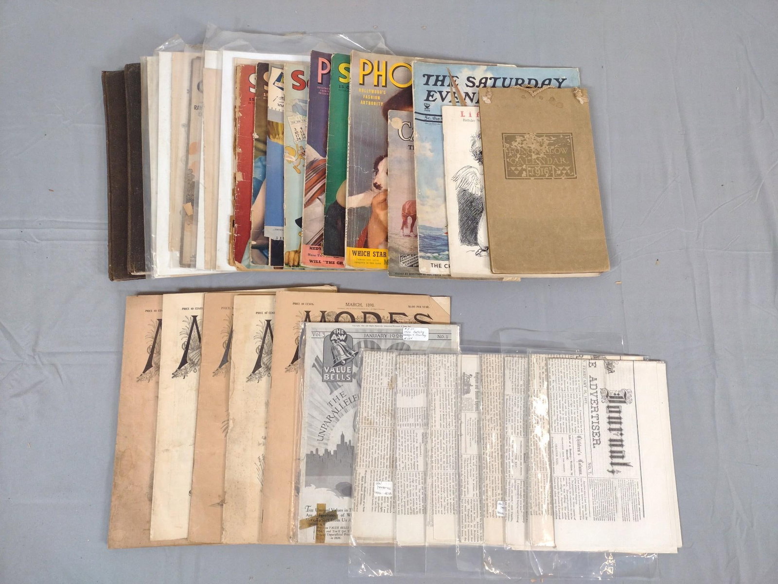 Grouping of Children's Ephemera: Includes calendars, advertisements, magazines and more. Includes Screen Guide, Photoplay, and sheet music. All in acceptable condition with normal wear and tear.