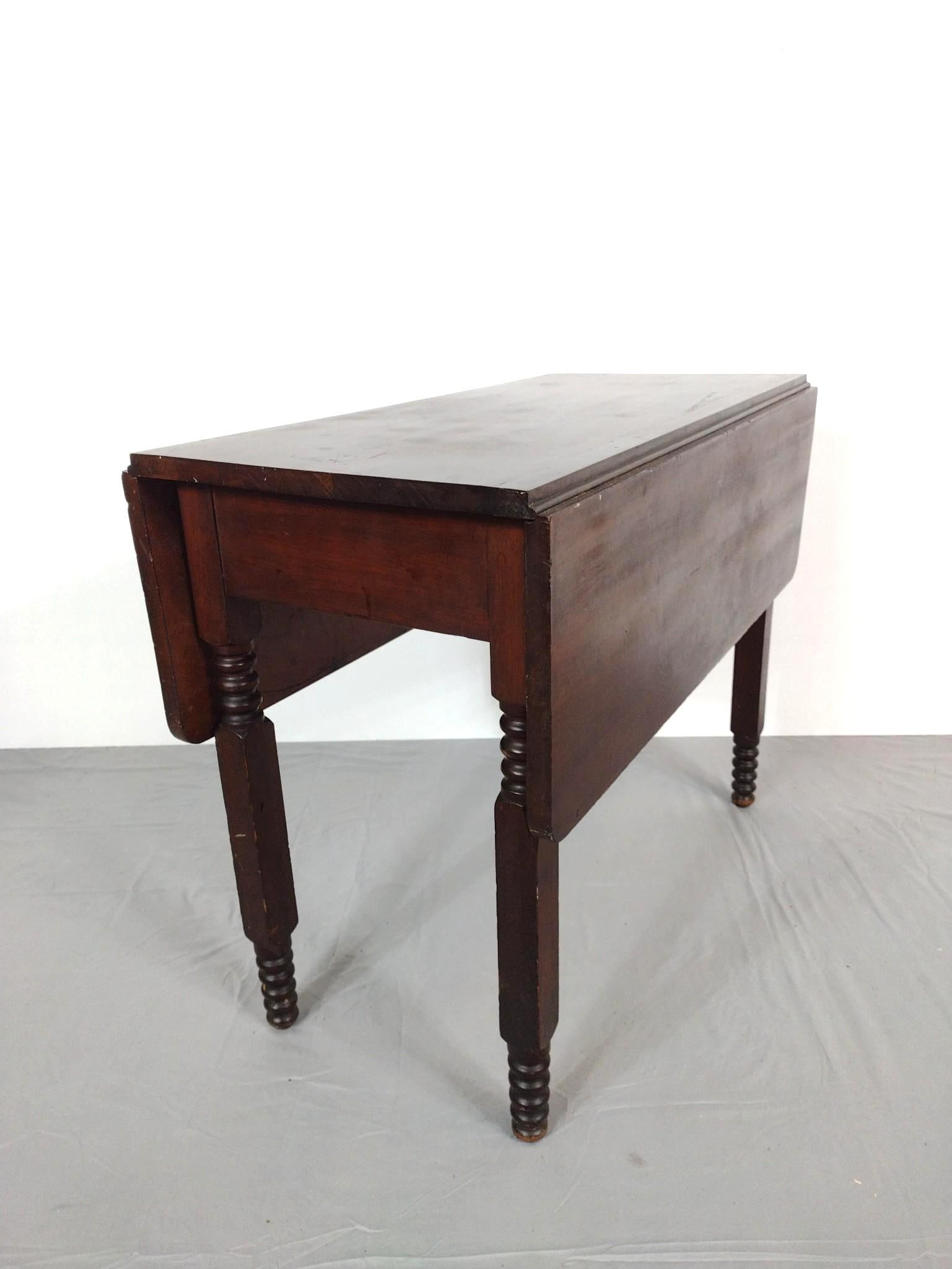 Drop Leaf Dining Table: Open 41", closed 18-1/2" wide X 38" deep X 28-1/2" high. Has scratches and some finish loss. MG.