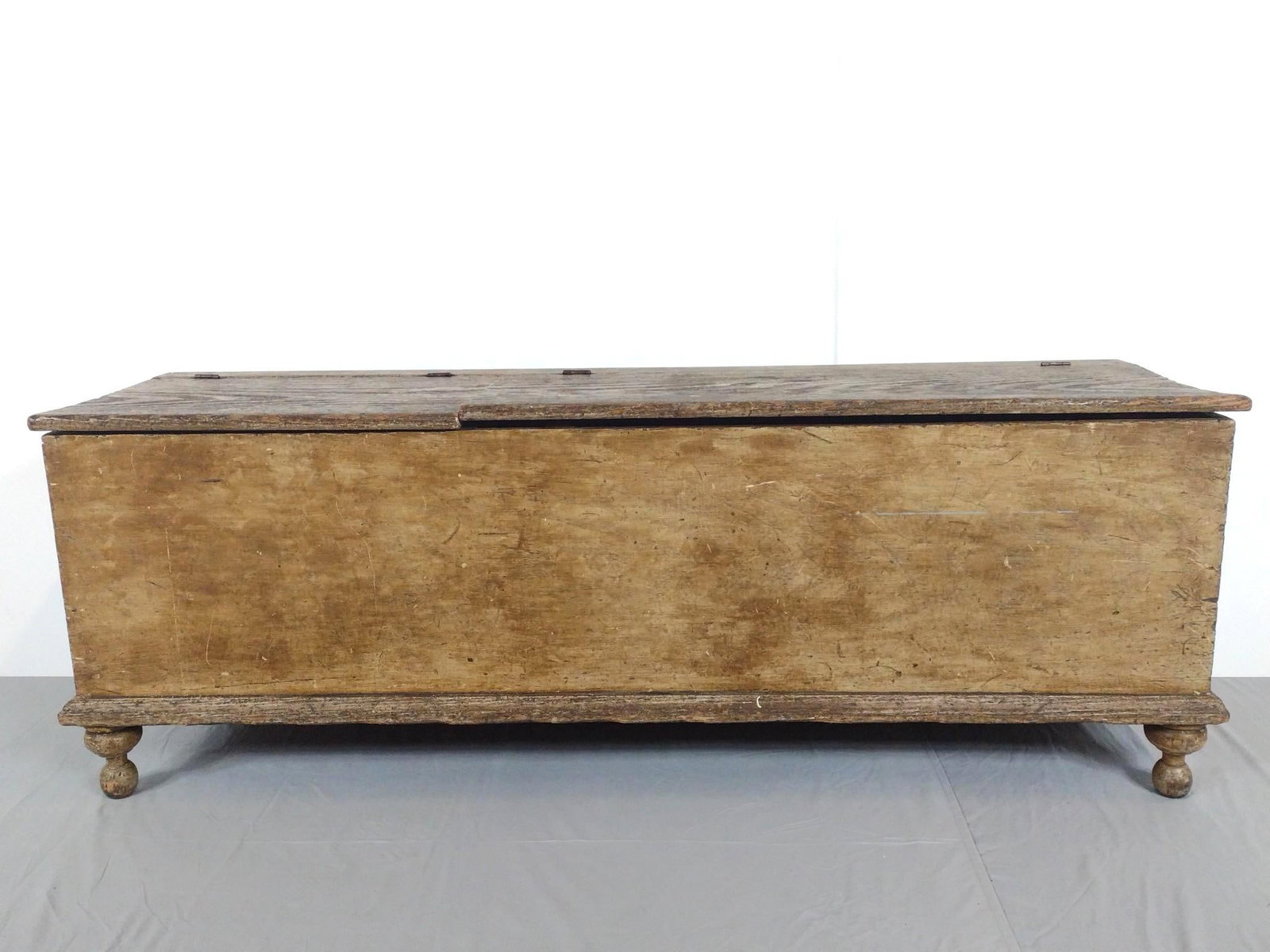 Antique Divided Blanket Chest: 61" wide X 17-1/2" deep X 22" high. Has some scratches and paint loss. MG.