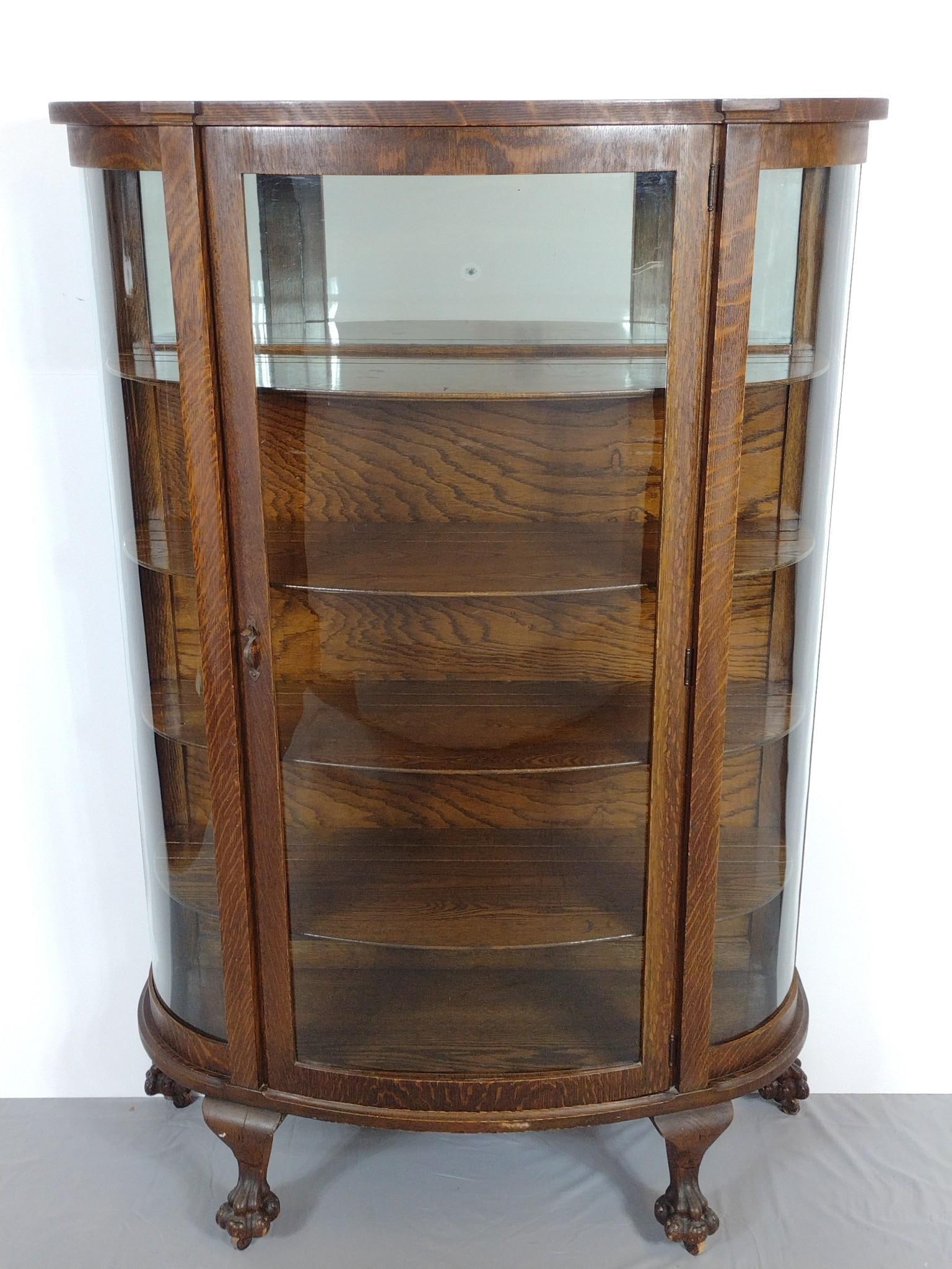 Bow Front Curio Cabinet: 42" wide X 15-1/4" deep X 63" high. Has a few light scratches. MG.